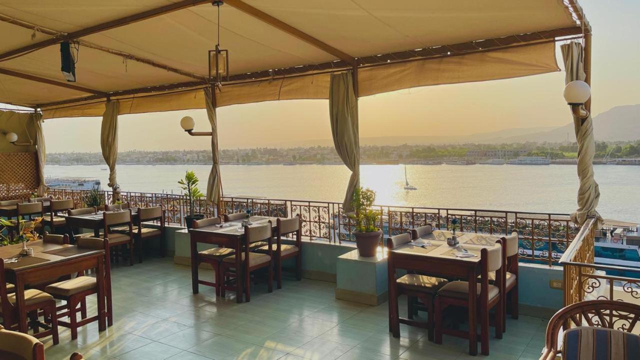 Отель Merry Land & Roof Nile Restaurant Луксор